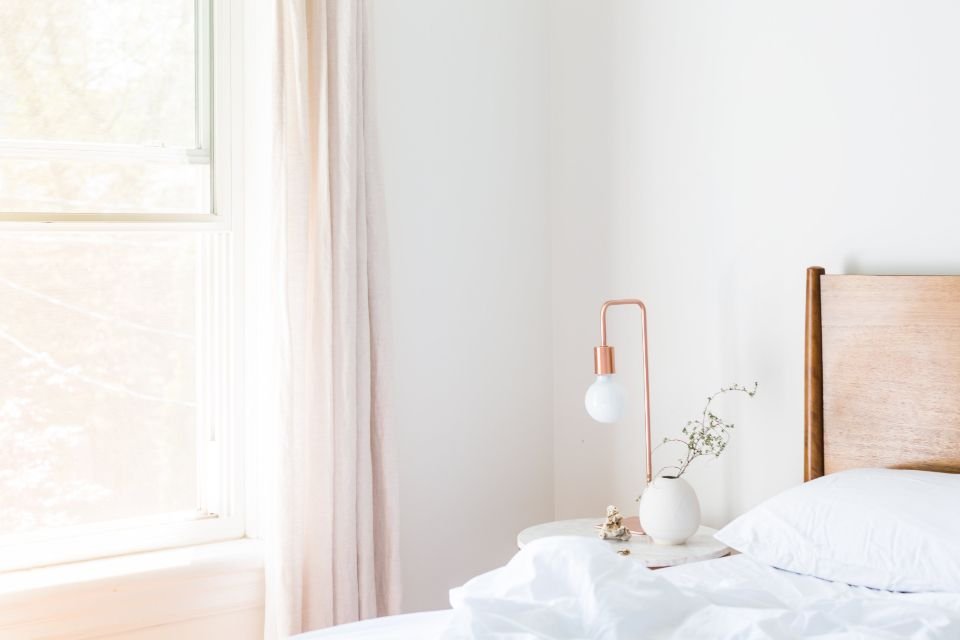 Bright, peaceful bedroom in morning light – waking calmly after a dream of snakes and seeking its biblical meaning