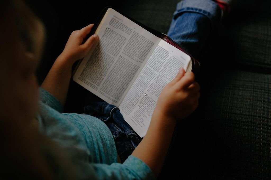 Young woman reading the Bible – what is a spiritual spouse according to Scripture